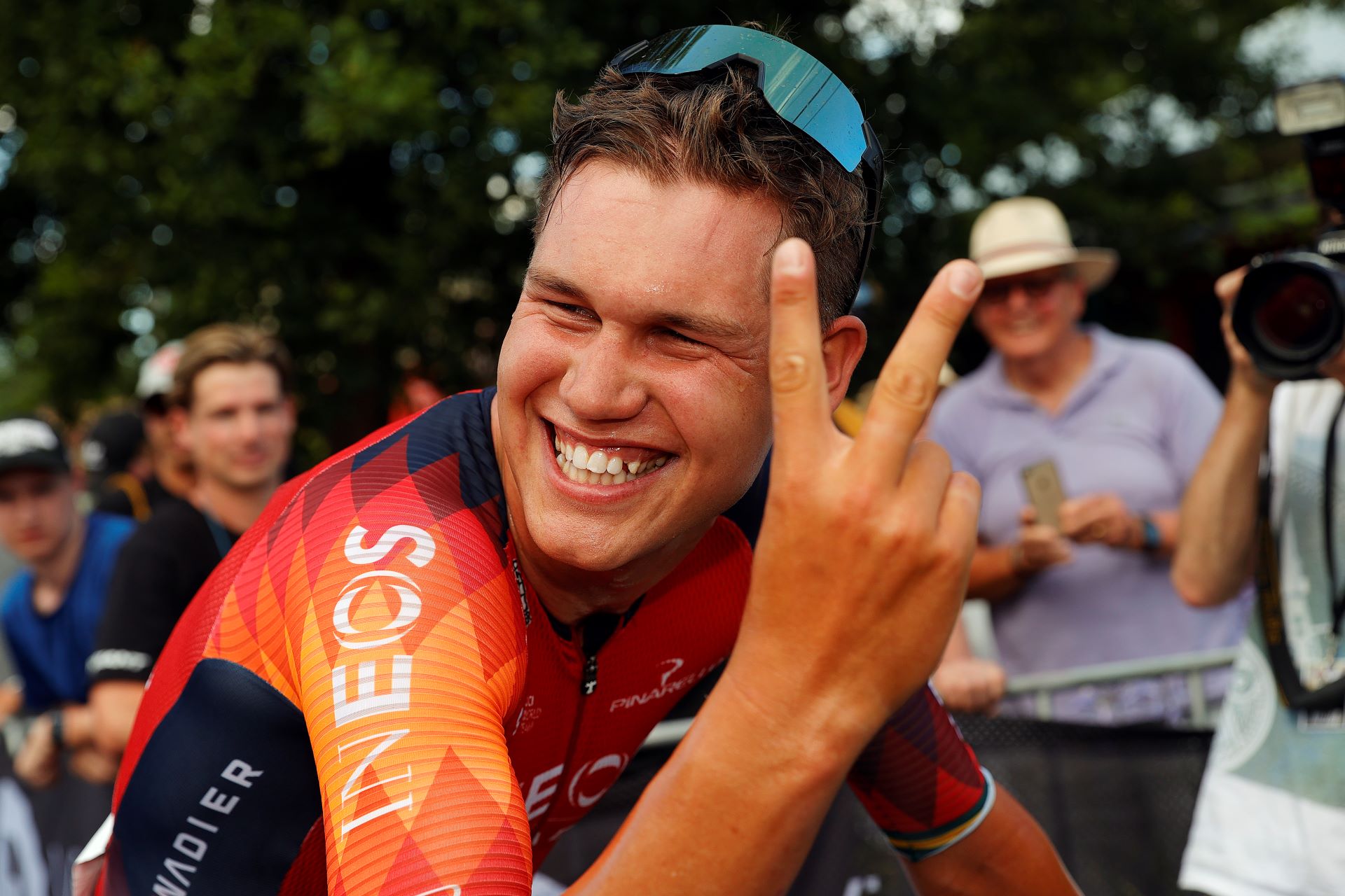 Lucas Plapp raises two fingers after winning his second consecutive road race national championship at the 2023 AusCycling Road National Championships in Buninyong, Ballarat